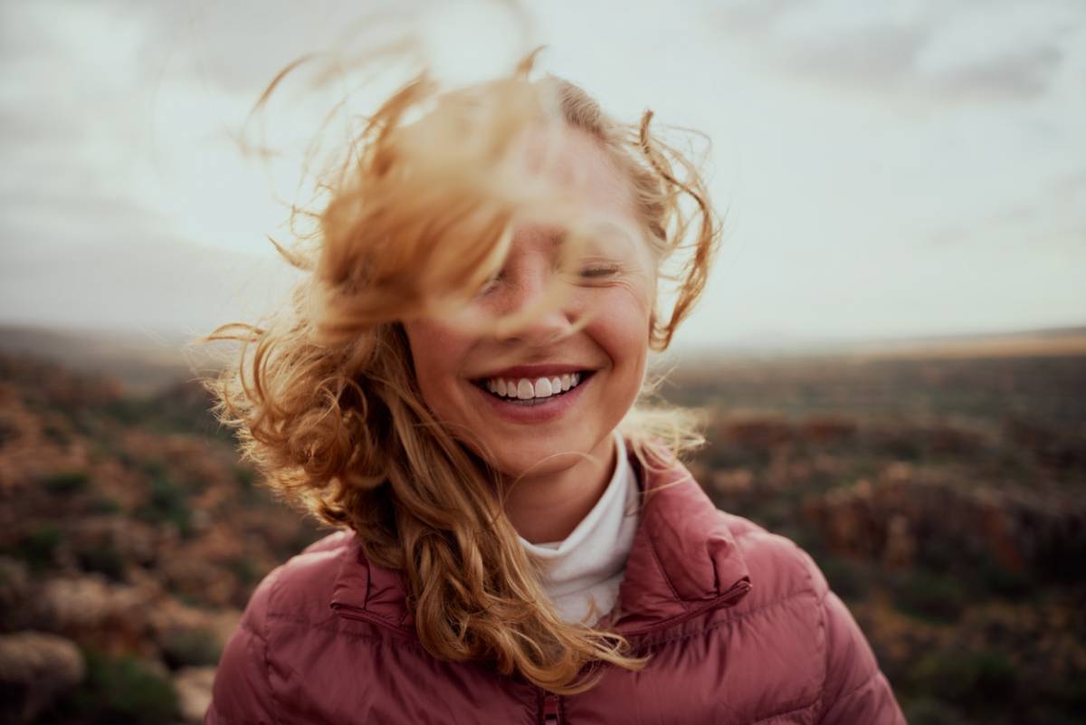 Woman smiling after cosmetic dentistry